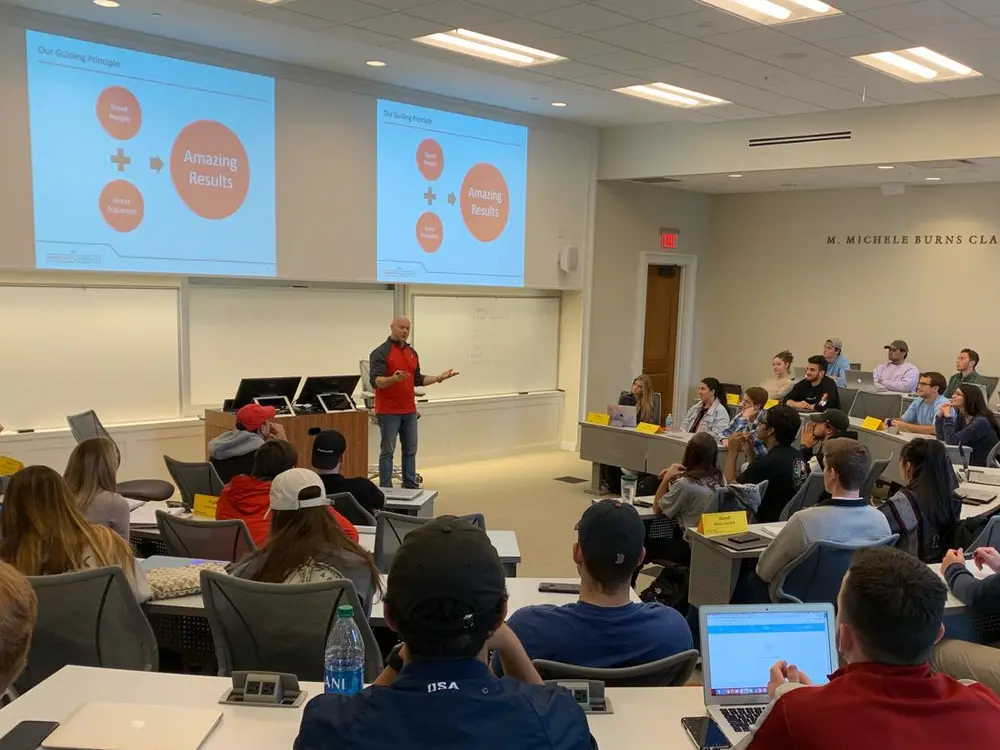 Beau Groover teaching a full classroom