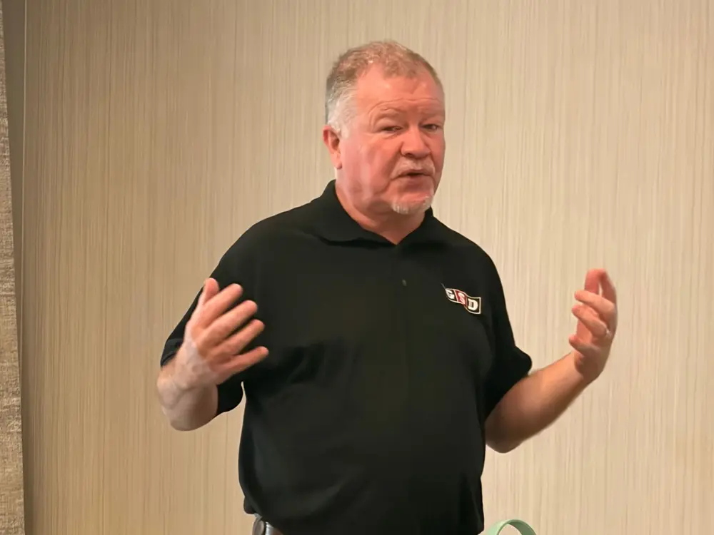 Gerry O'Hanlon in a GSD polo, teaching a group